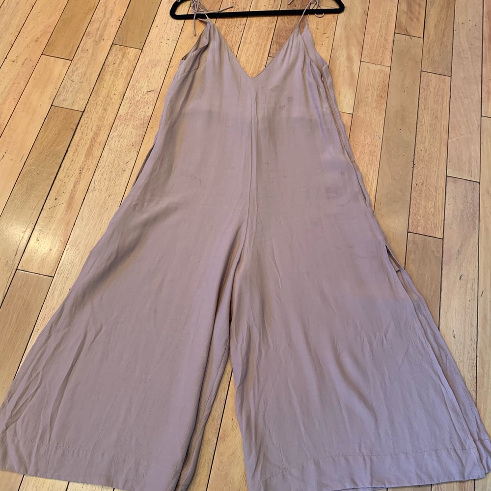 Super cute Nyla jumpsuit with original tags on!